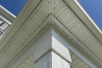 Permanent LED track lighting installed at roofline peak