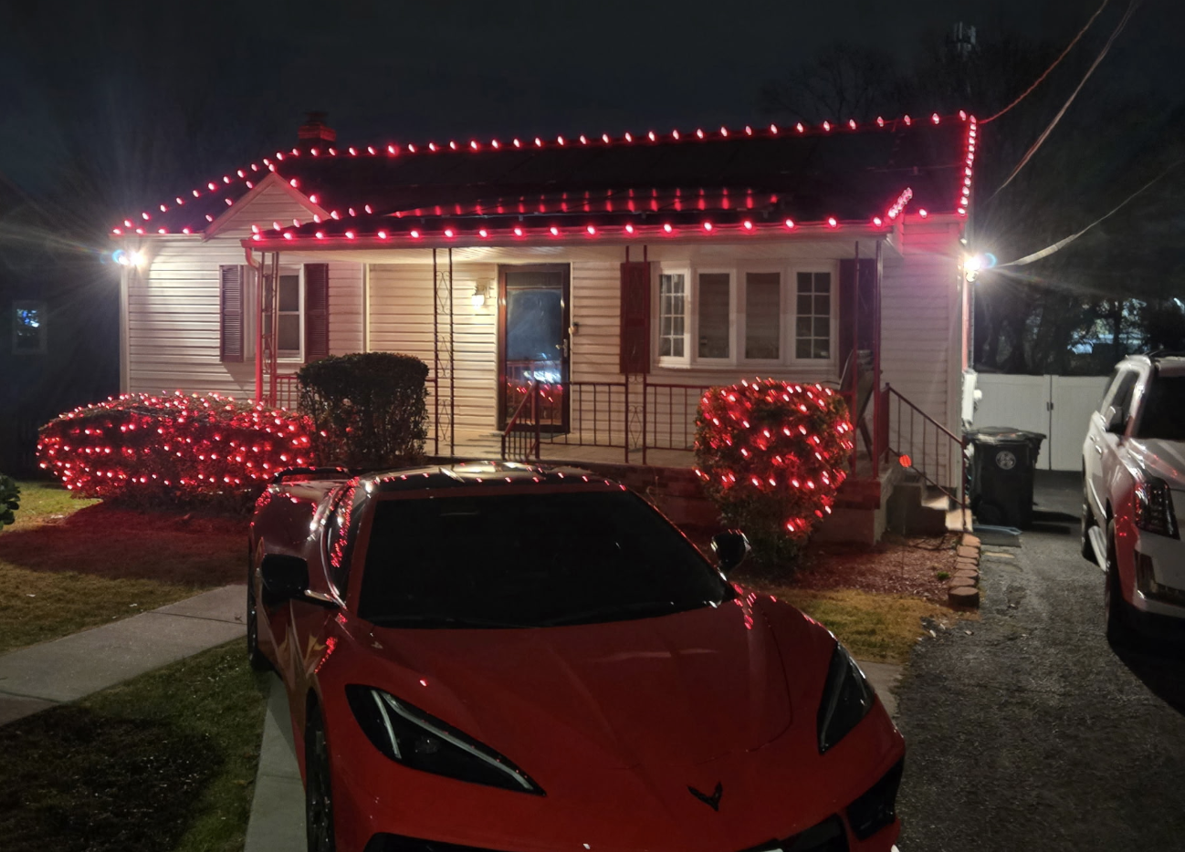 Holiday roofline lighting installation on a Maryland home